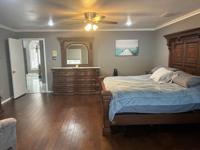 bedroom with ornamental molding, dark hardwood / wood-style floors, and ceiling fan