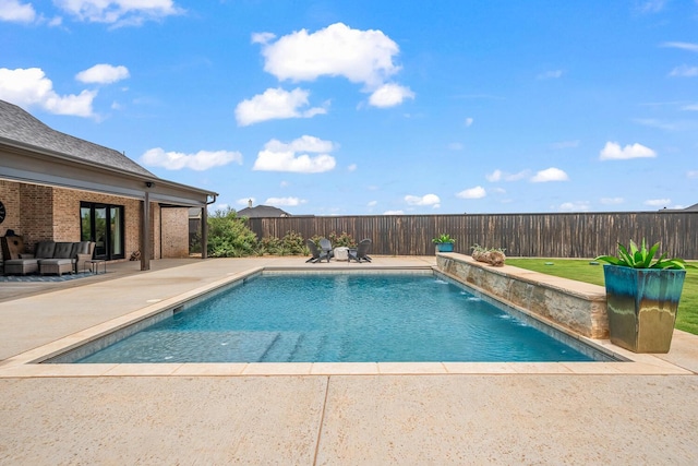 7733 46th St, Lubbock, TX 79407 - view of pool with outdoor lounge area, a patio area, and a fenced backyard