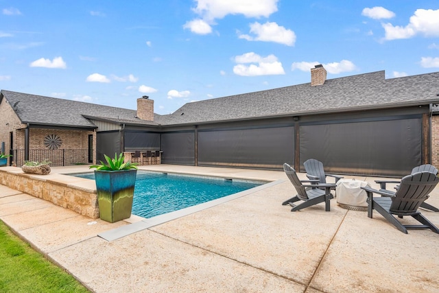 7733 46th St, Lubbock, TX 79407 - view of swimming pool with a patio