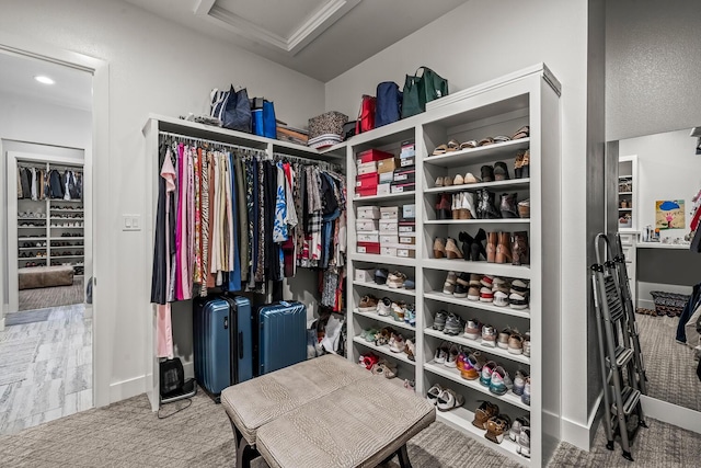 7733 46th St, Lubbock, TX 79407 - spacious closet with attic access and carpet floors