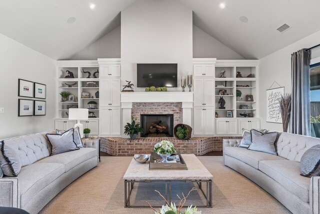 7733 46th St, Lubbock, TX 79407 - living area featuring high vaulted ceiling, light colored carpet, a fireplace, and built in features