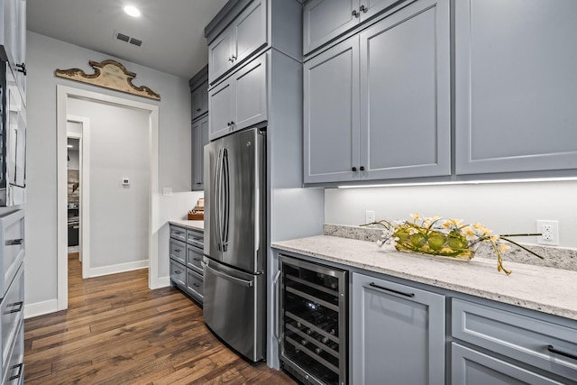 7733 46th St, Lubbock, TX 79407 - kitchen featuring wine cooler, freestanding refrigerator, gray cabinetry, dark wood-style floors, and recessed lighting