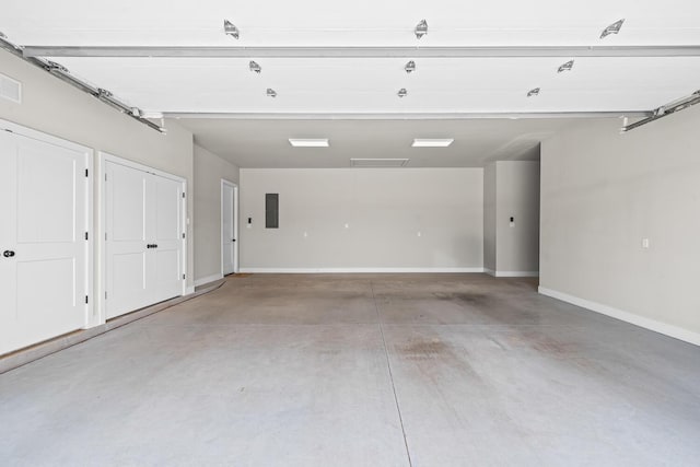7733 46th St, Lubbock, TX 79407 - garage featuring electric panel and baseboards