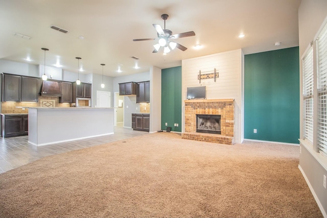 5728 109th St, Lubbock, TX 79424 - unfurnished living room featuring recessed lighting, a fireplace, a ceiling fan, visible vents, and baseboards