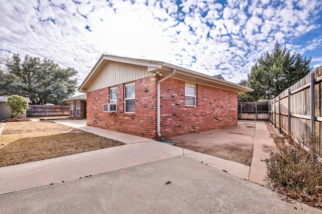 view of property exterior featuring a patio