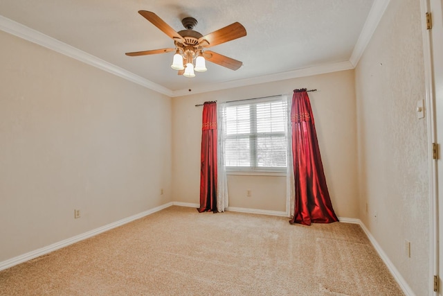 unfurnished room featuring ceiling fan, light colored carpet, and ornamental molding