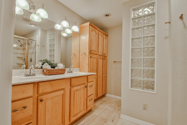 bathroom featuring vanity, tile patterned floors, and a shower with shower door