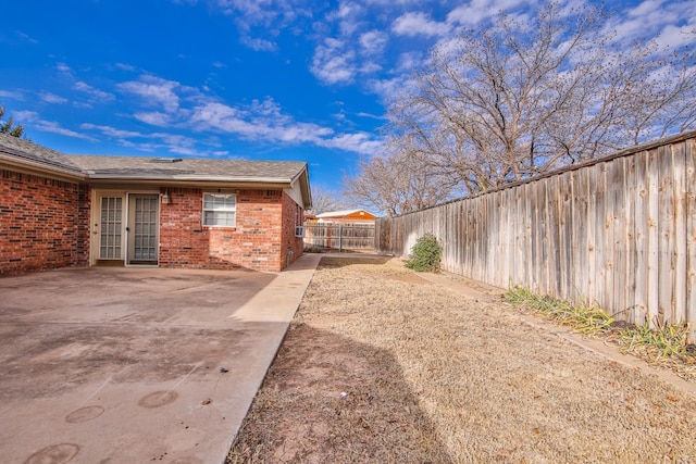 view of yard with a patio area