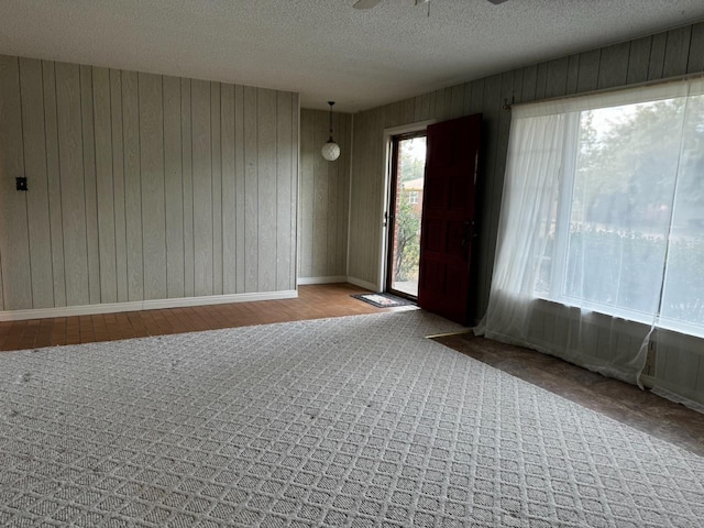 spare room featuring a textured ceiling