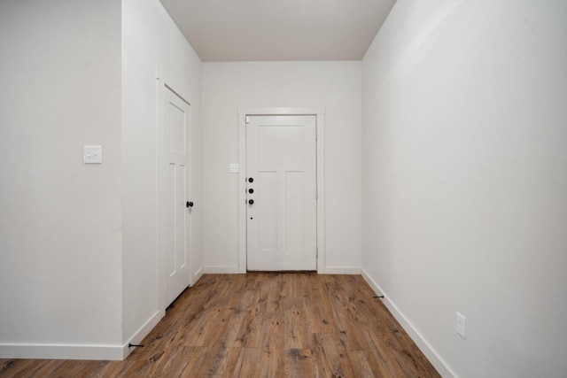 doorway to outside featuring hardwood / wood-style flooring