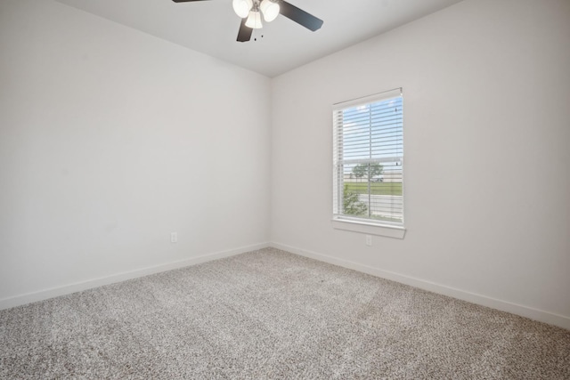 unfurnished room with carpet flooring and ceiling fan