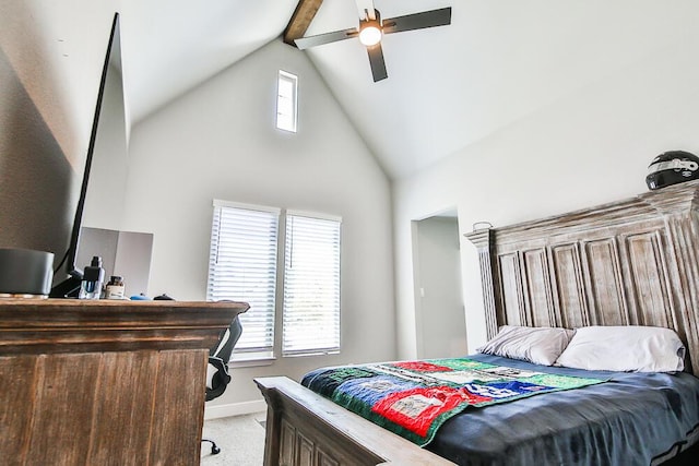 bedroom featuring light colored carpet, a ceiling fan, high vaulted ceiling, beamed ceiling, and baseboards