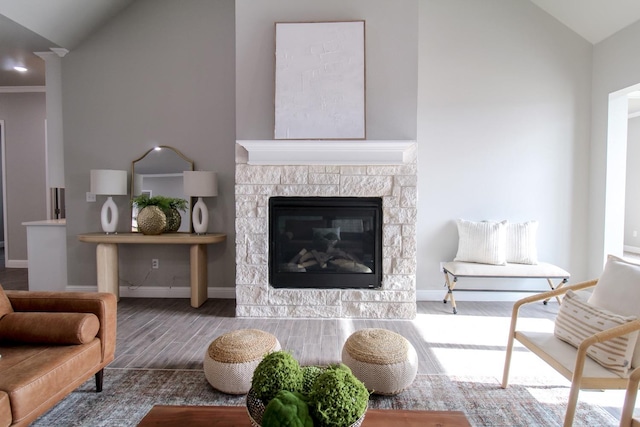 living room with lofted ceiling and wood-type flooring