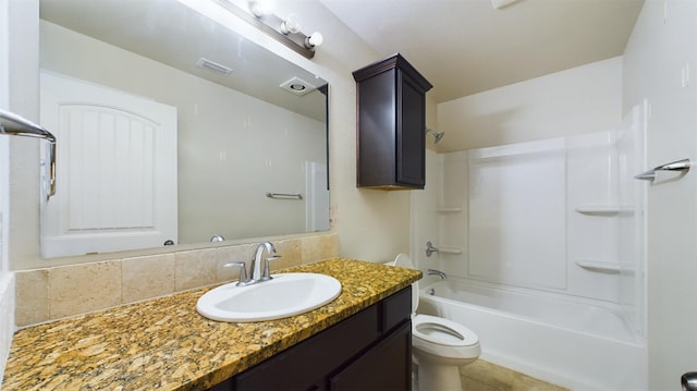 full bathroom featuring vanity, toilet, and bathing tub / shower combination