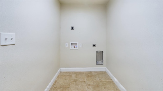 washroom featuring hookup for a washing machine, hookup for an electric dryer, and light tile patterned flooring