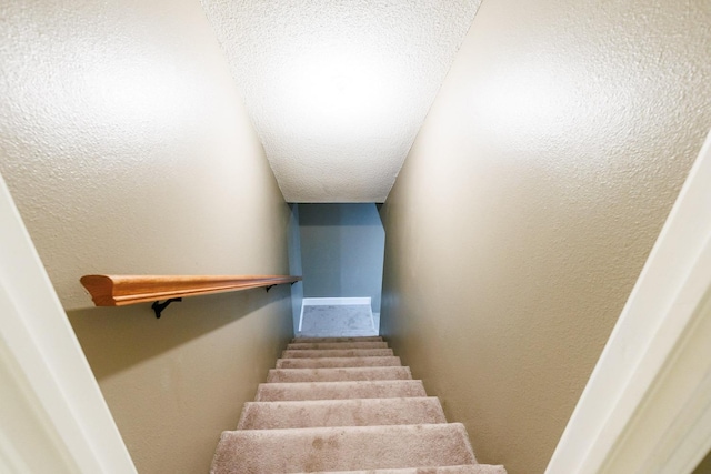 3709 156th St, Lubbock, TX 79423 - stairway with a textured ceiling