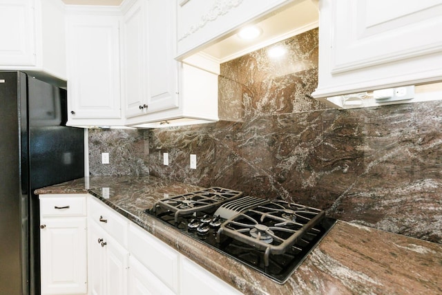 3709 156th St, Lubbock, TX 79423 - kitchen with black appliances, white cabinetry, and decorative backsplash
