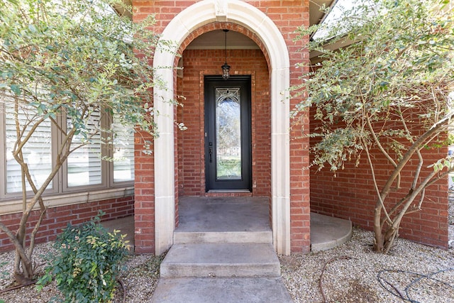 3709 156th St, Lubbock, TX 79423 - property entrance featuring brick siding