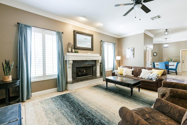 3709 156th St, Lubbock, TX 79423 - tiled living area with ornamental molding, ceiling fan, and a high end fireplace