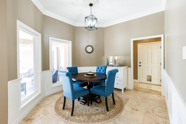 3709 156th St, Lubbock, TX 79423 - dining area with a chandelier, ornamental molding, and wainscoting