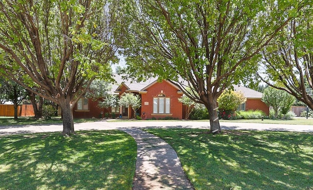 3709 156th St, Lubbock, TX 79423 - obstructed view of property with brick siding