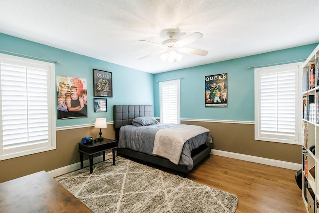 3709 156th St, Lubbock, TX 79423 - bedroom with wood finished floors and ceiling fan