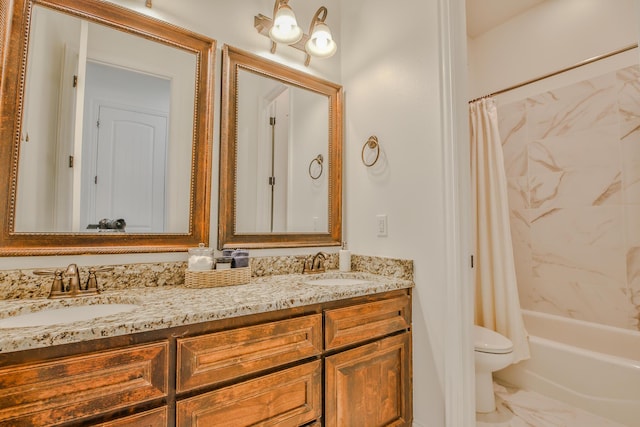 full bathroom featuring toilet, a sink, marble finish floor, double vanity, and shower / bath combo with shower curtain