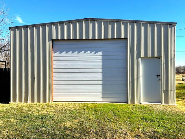 garage with a yard