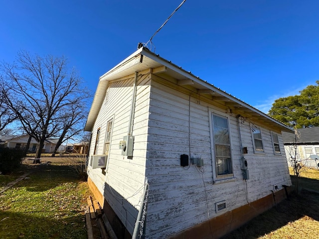 view of home's exterior featuring cooling unit