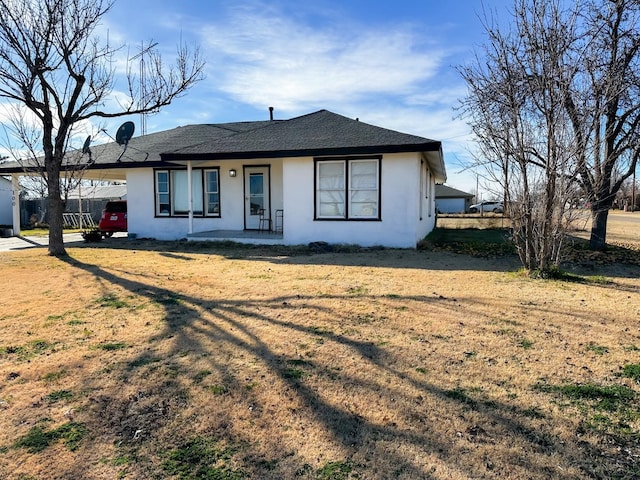 ranch-style house with a front yard