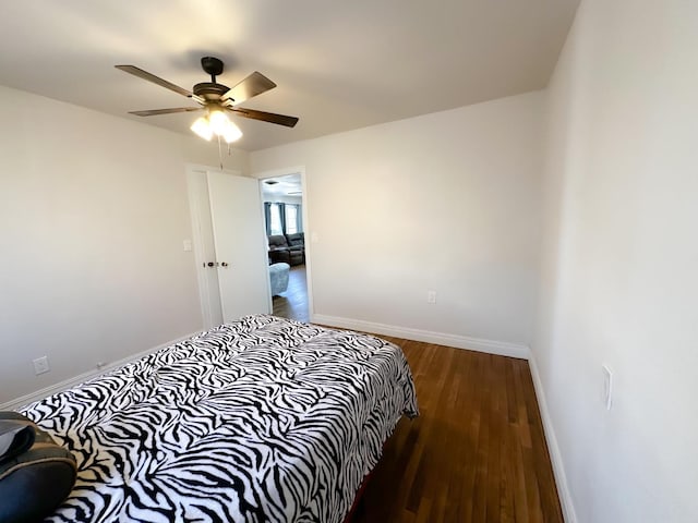 bedroom featuring ceiling fan and hardwood / wood-style floors