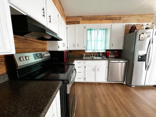 kitchen featuring white cabinetry, stainless steel appliances, light hardwood / wood-style floors, and sink