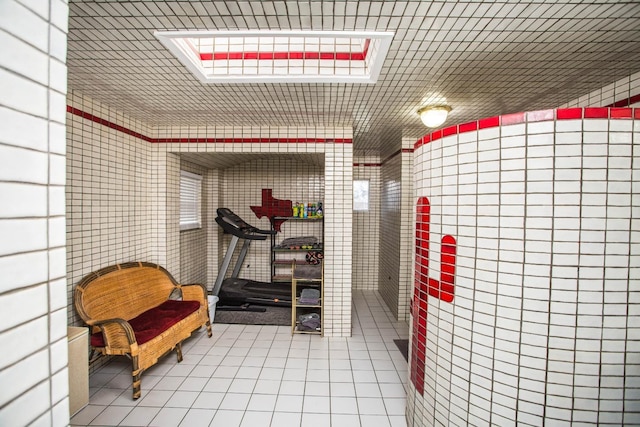 storage room featuring a skylight