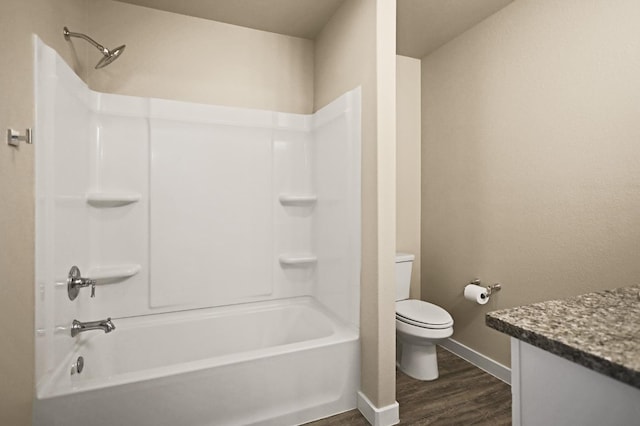 full bathroom featuring wood-type flooring, toilet, shower / bath combination, and vanity