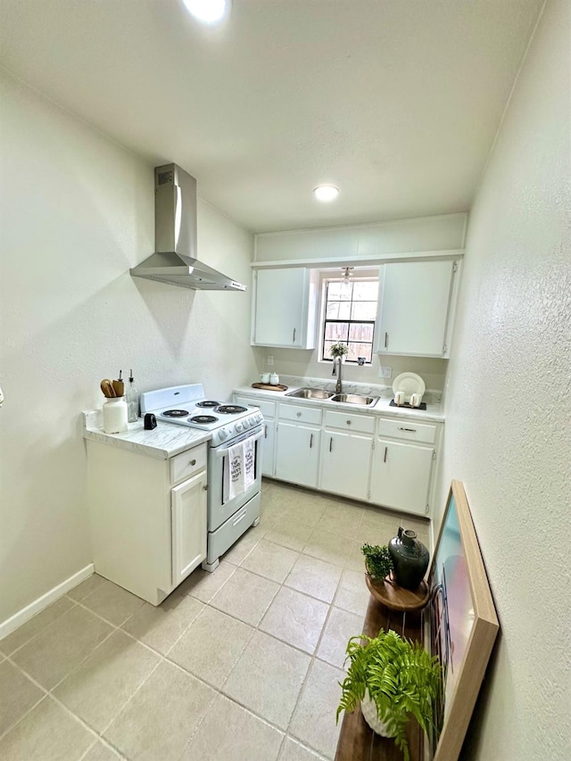 kitchen featuring a sink, white cabinets, light countertops, white range with electric stovetop, and wall chimney exhaust hood