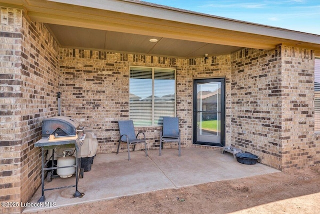 7116 23rd St, Lubbock, TX 79407 - view of patio featuring grilling area