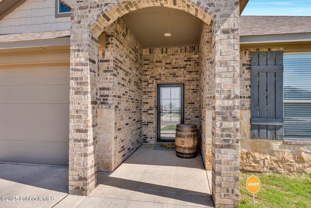 7116 23rd St, Lubbock, TX 79407 - doorway to property with brick siding