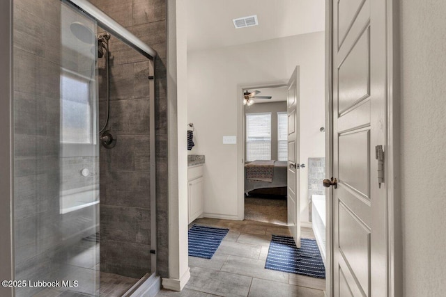 7116 23rd St, Lubbock, TX 79407 - ensuite bathroom with a stall shower and a ceiling fan
