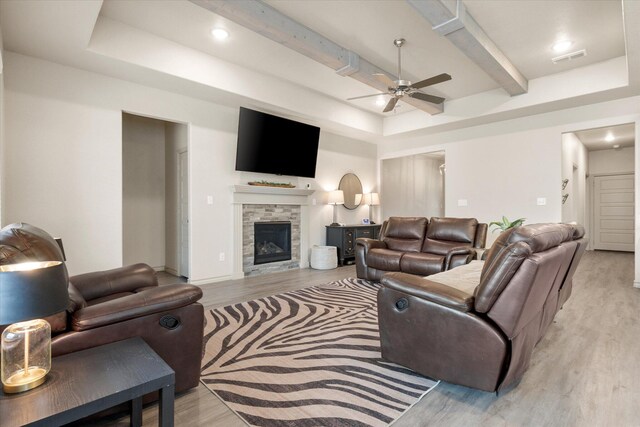 carpeted bedroom featuring a textured ceiling and ceiling fan