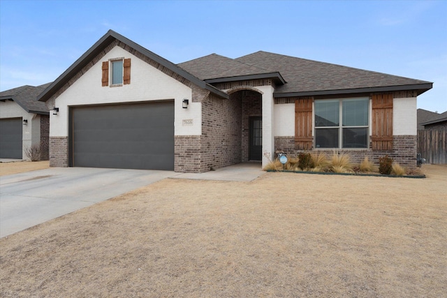 view of front of home with a garage