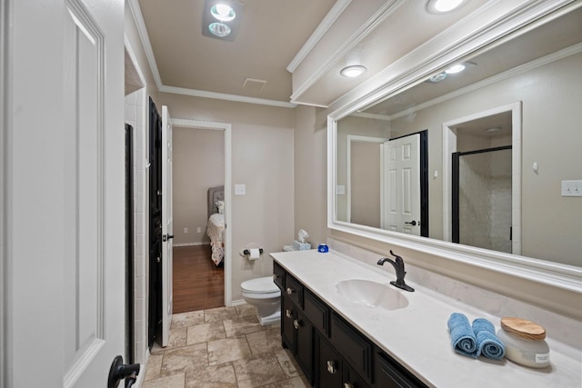 bathroom featuring vanity, an enclosed shower, crown molding, and toilet