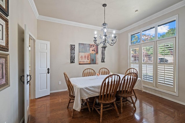 dining area with ornamental molding, dark hardwood / wood-style floors, and a chandelier