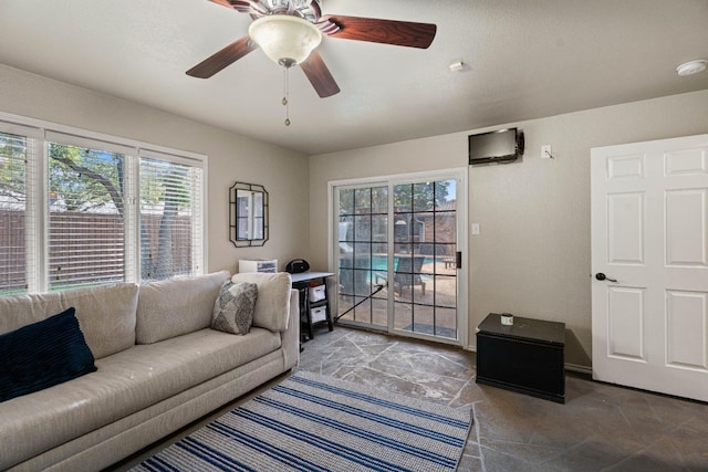 living room featuring ceiling fan