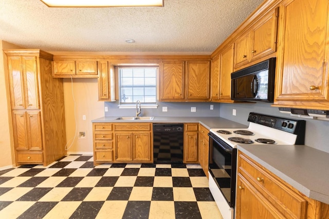 kitchen featuring sink, a textured ceiling, and black appliances