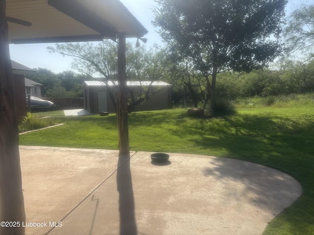 1 Squaw Ln, Ransom Canyon, TX 79366 - view of grassy yard with a patio area and an outbuilding