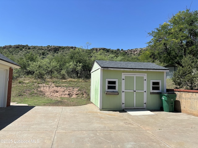1 Squaw Ln, Ransom Canyon, TX 79366 - view of shed with a mountain view