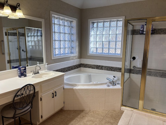 1 Squaw Ln, Ransom Canyon, TX 79366 - full bath featuring a bath, vanity, a shower stall, and tile patterned flooring