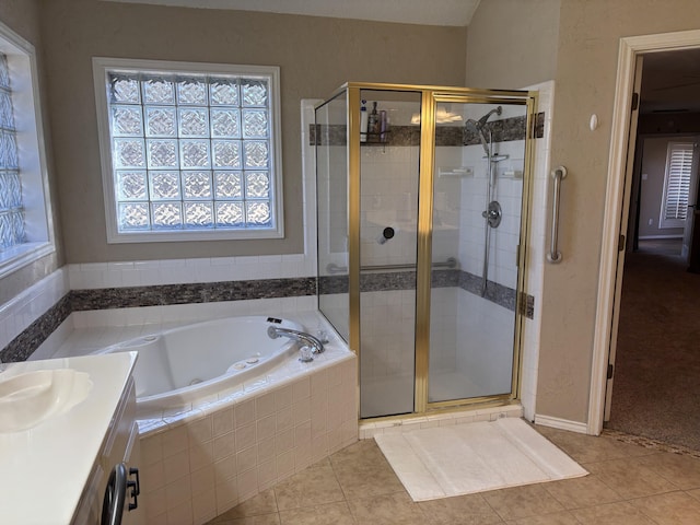 1 Squaw Ln, Ransom Canyon, TX 79366 - full bathroom with tile patterned flooring, a whirlpool tub, a stall shower, and vanity