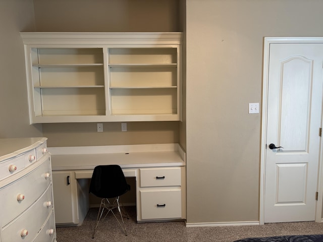 1 Squaw Ln, Ransom Canyon, TX 79366 - unfurnished office featuring built in desk and dark carpet