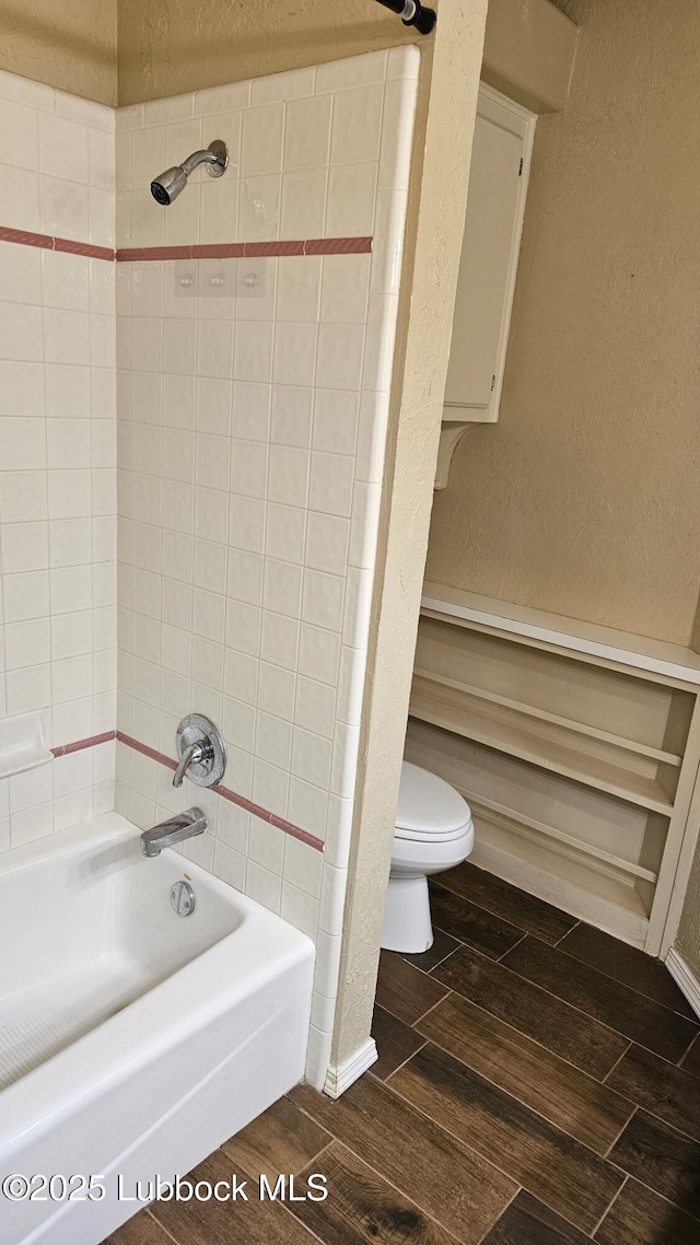 1 Squaw Ln, Ransom Canyon, TX 79366 - full bath featuring shower / bath combination, wood finished floors, and a textured wall